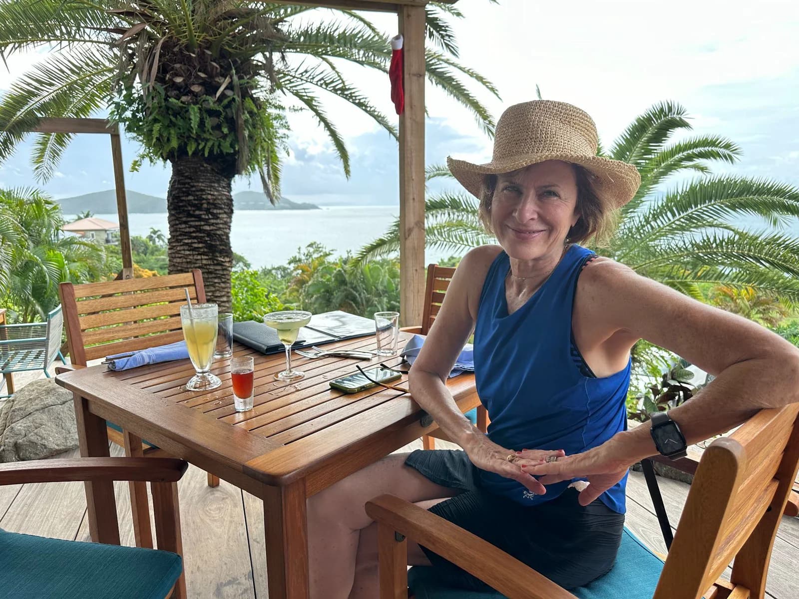 Patti Tauber, Austin Senior Real Estate Specialist, seated outdoors
